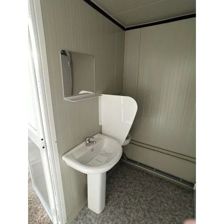 Sanitario SDU con WC, ducha, lavabo y urinario