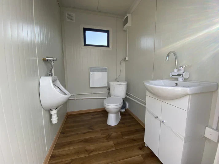 Contenedor sanitario doble con depósito de residuos.